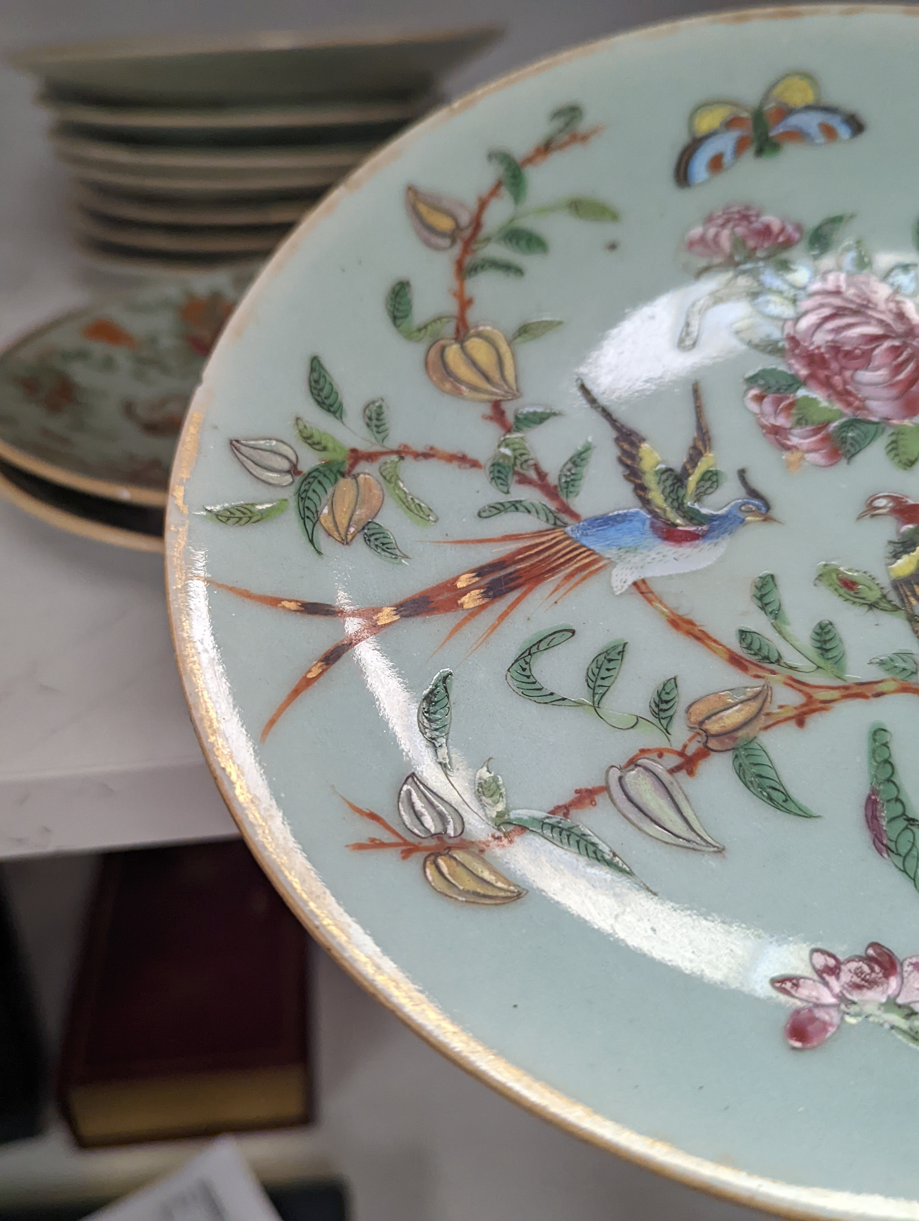 Eleven Chinese celadon ground famille rose plates, mid 19th century 22cm